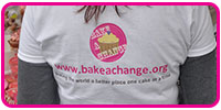 Bake a change logo on a tshirt with baking the world a better place one cake at a time